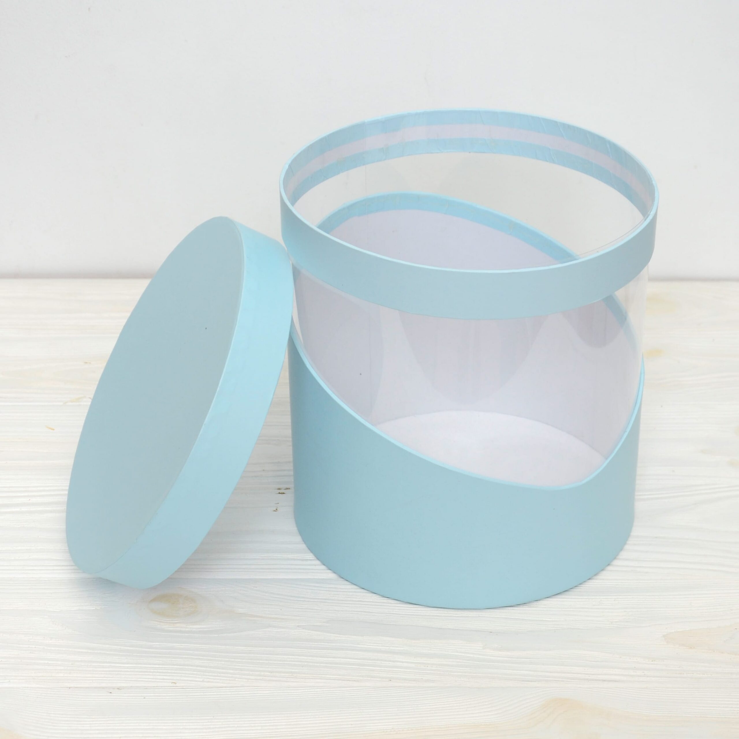 Коробка кругла Прозора смужка блакитна 21*21 см 2 Коробка кругла