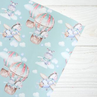 Папір подарунковий в листах 100*70 см (блакитний - звірята на повітряних кулях)