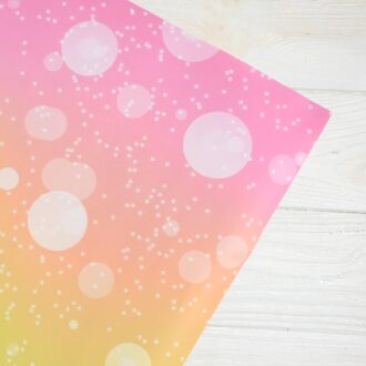 Папір подарунковий в листах 100*70 см (веселковий - кола)